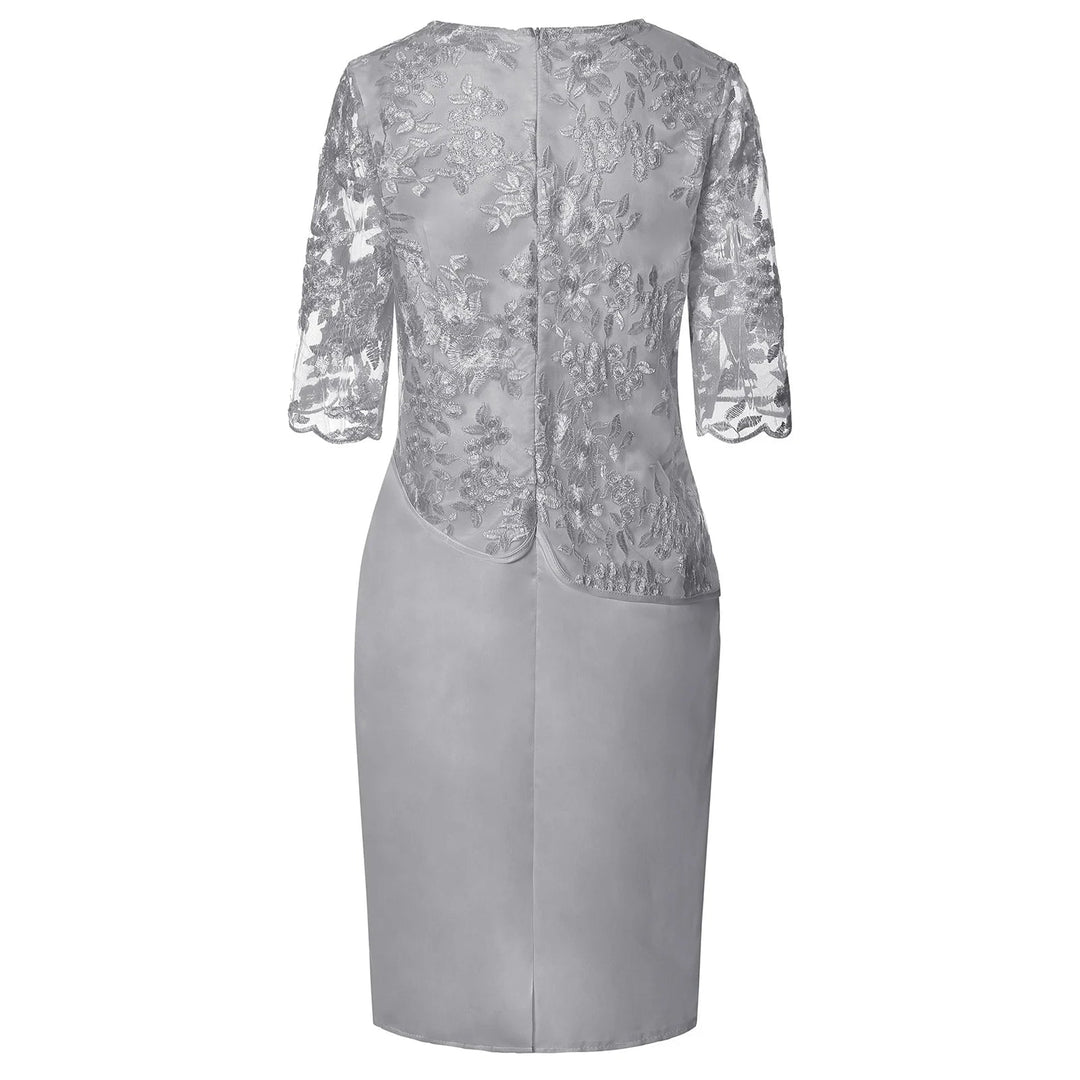Side view of the Frances midi dress in pink showcasing the flattering faux-wrap cut and elegant length
