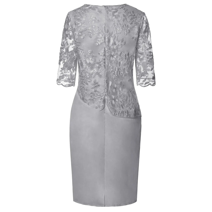 Side view of the Frances midi dress in pink showcasing the flattering faux-wrap cut and elegant length