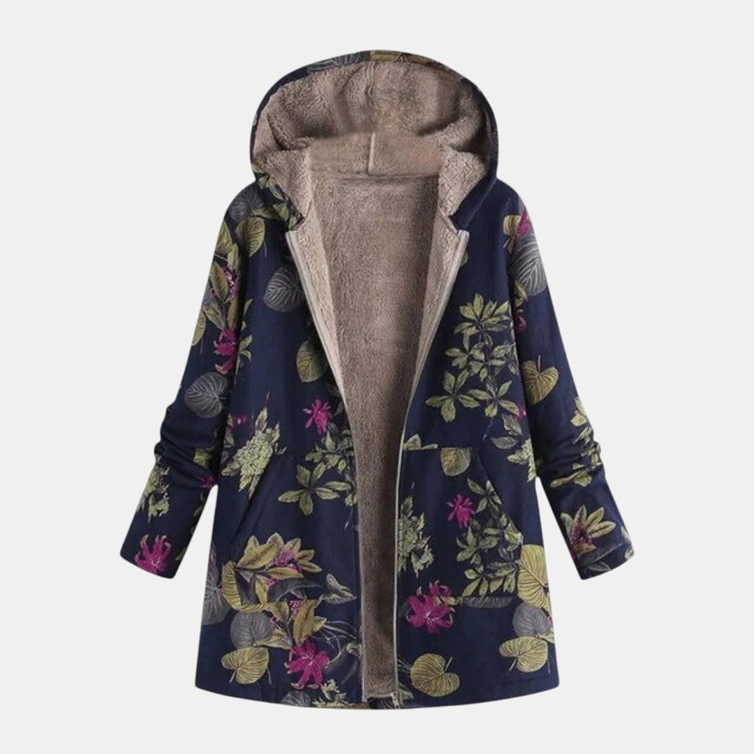 Woman wearing the Frances cozy elegant coat in dark blue, featuring a tailored silhouette and soft premium fabric