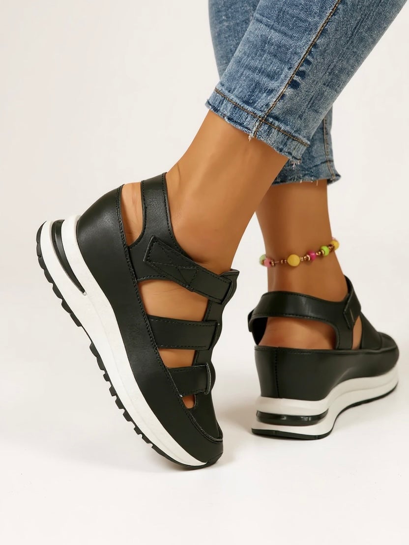 Freesia women's black platform sandals, close-up of strap buckle detail