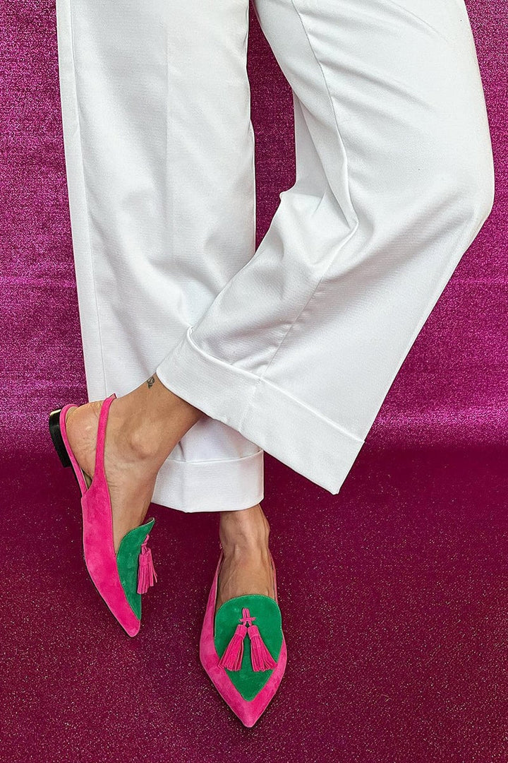 Colorful fringe ballet flats with decorative ankle strap in green, shown from the front on a neutral background