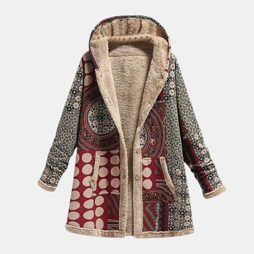 Woman wearing the Freya classic coat in a multicolor finish, featuring a tailored waist and clean, polished silhouette