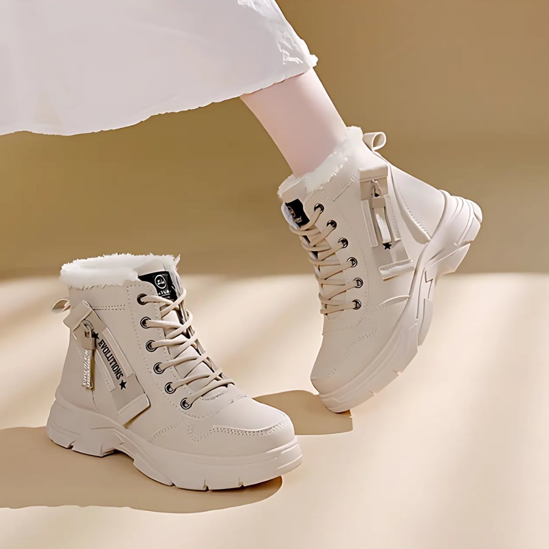 Freya comfort boots laid flat, showing the full boot length and sole detail