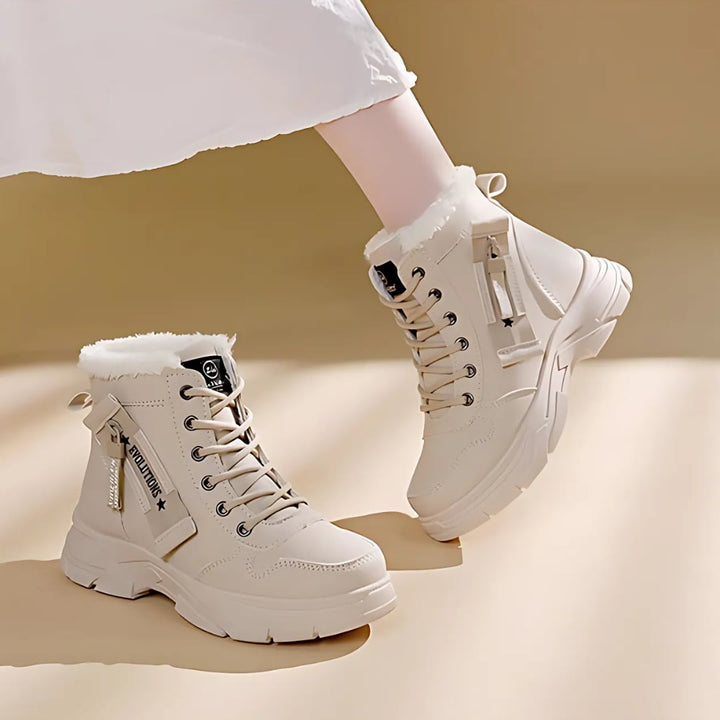 Freya comfort boots laid flat, showing the full boot length and sole detail