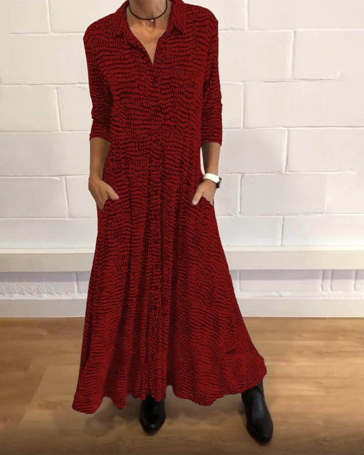 Front view of the Freya flowing maxi dress in red, showing full-length elegant drape