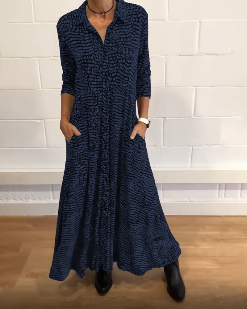 Side profile of a woman in the Freya maxi dress highlighting the figure-lengthening silhouette