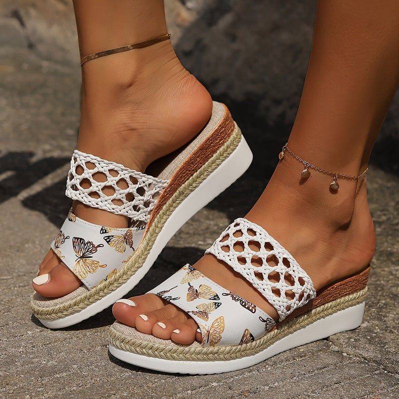 Close-up of woven strap detail on Freya wedge sandals in light brown