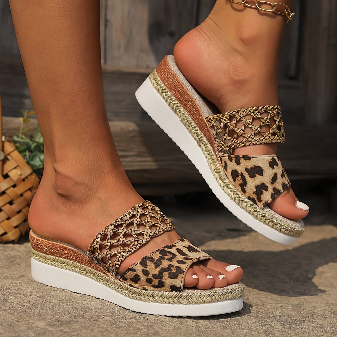 Freya woven wedge sandals in beige, front angle highlighting woven straps