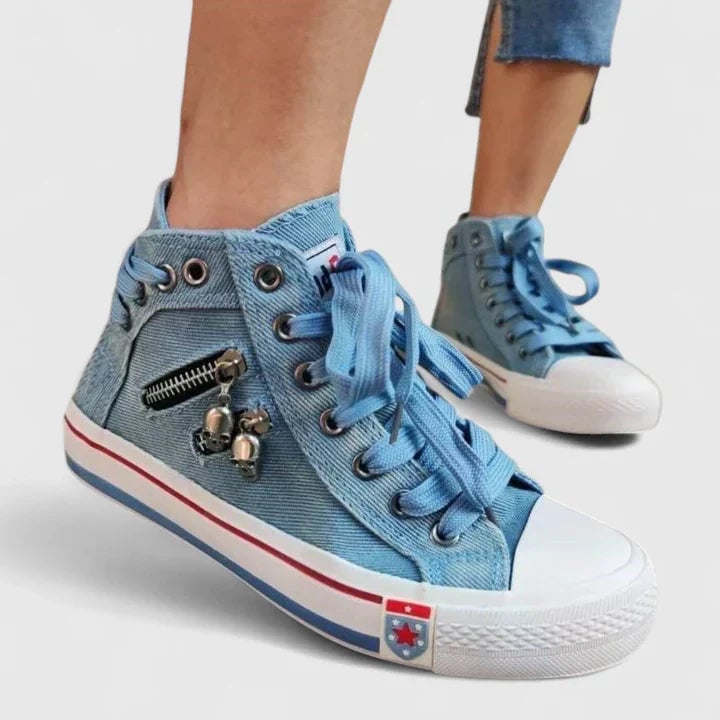 Pair of Freya denim high-top sneakers styled with cropped straight-leg jeans, casual outfit flat lay
