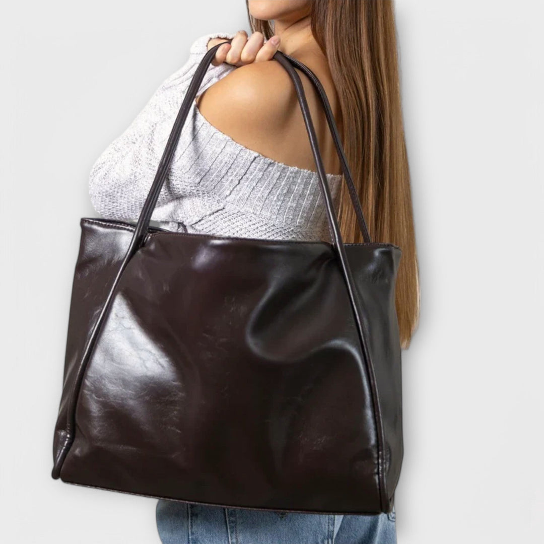 Freydis dark brown handbag side profile view