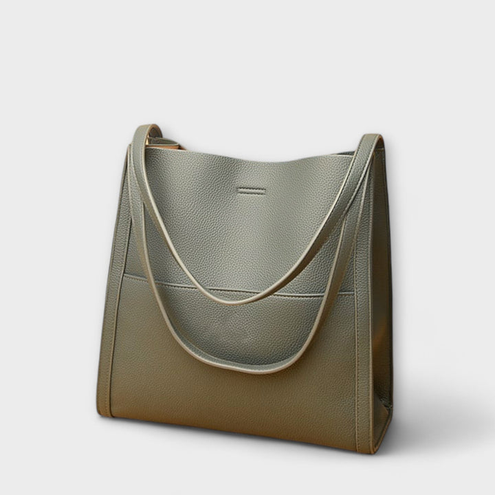 Freydis handbag side profile displaying depth and structured silhouette