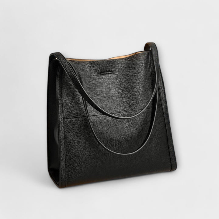 Flat lay of Freydis structured handbag showing all available color options