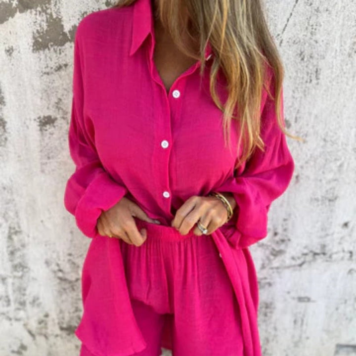 Flat lay of the Funa two-piece set showing shirt and pants side by side
