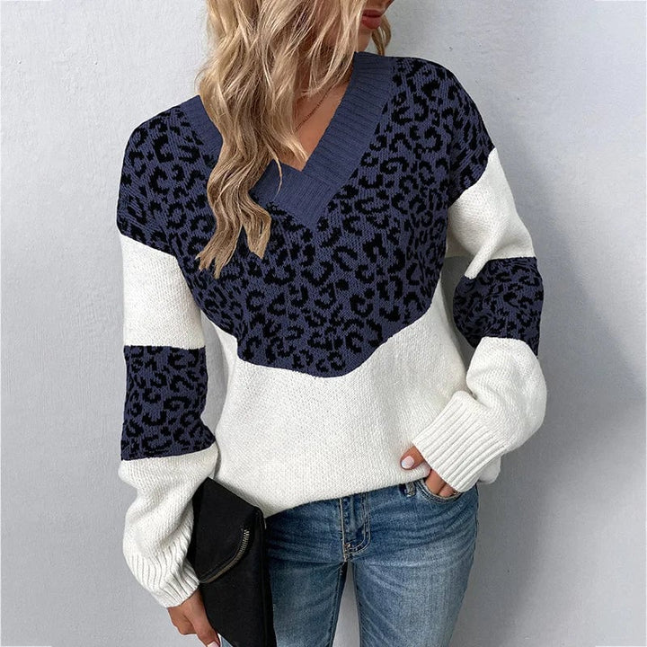 Close-up of the Gabriela leopard print V-neck sweater showing soft fabric texture and elegant print detail