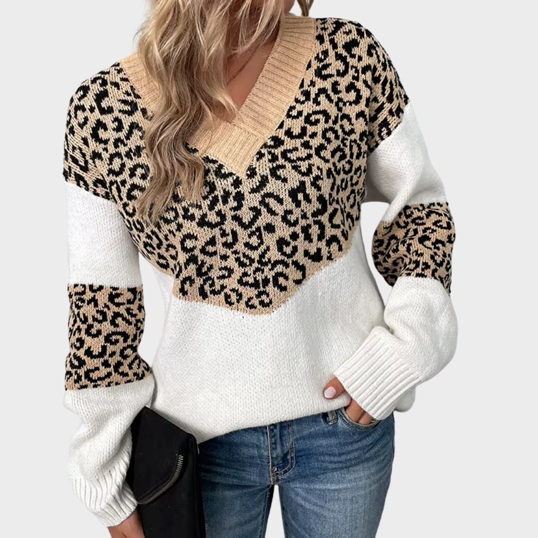Flat lay of the Gabriela V-neck leopard print sweater in purple showing full length and print detail