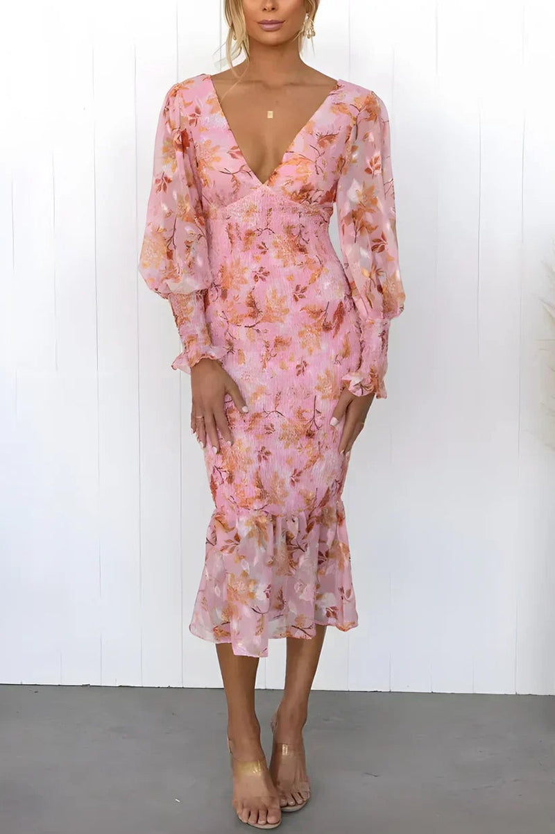 Close-up of the floral print detail on the Gabrielle draped evening dress in pink