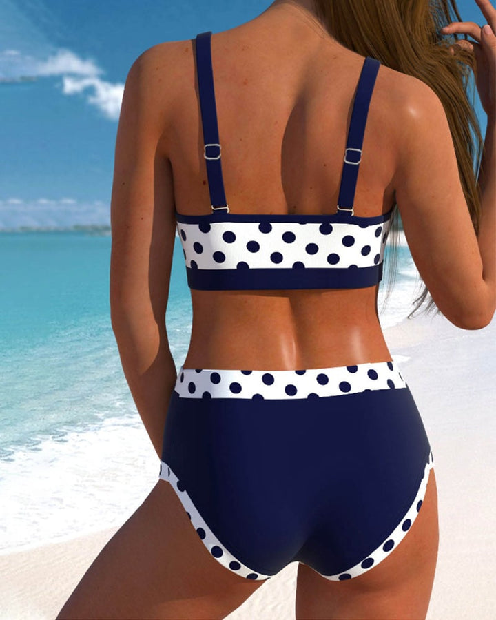 Back view of the Gabrielle high waist retro polka dot bikini set showing adjustable straps and fitted waistband