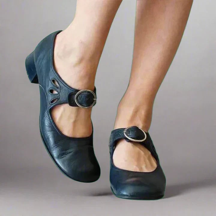 Side view of Gabrielle orthopedic sandals in navy blue showing ergonomic sole and strap detail