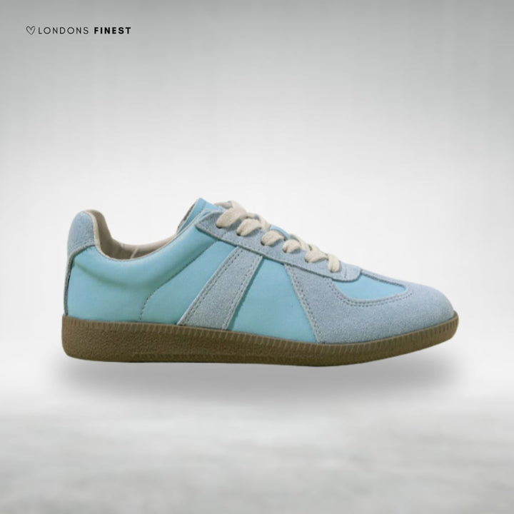 Gabrielle orthopedic shoes in light blue displayed at an angle, highlighting contoured insole and breathable upper