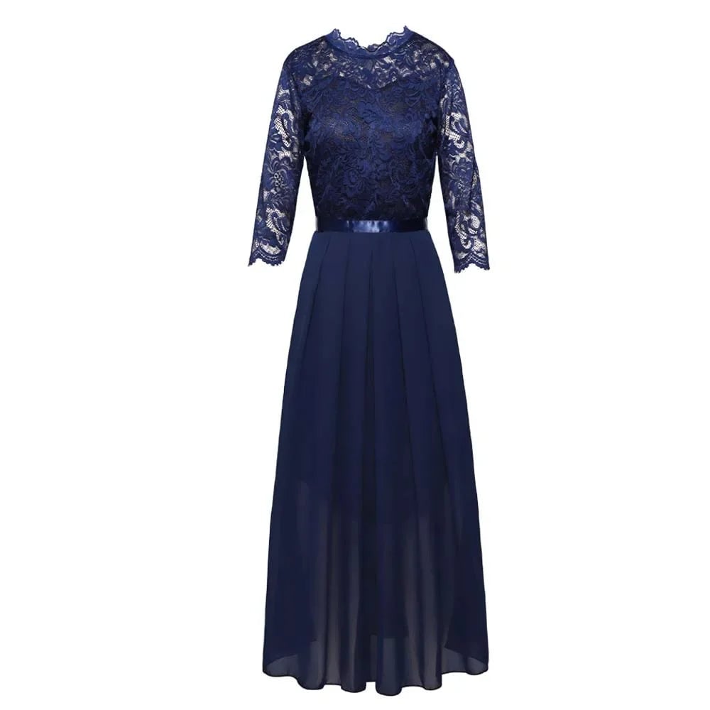 Close-up of delicate lace overlay bodice on a formal maxi dress in green