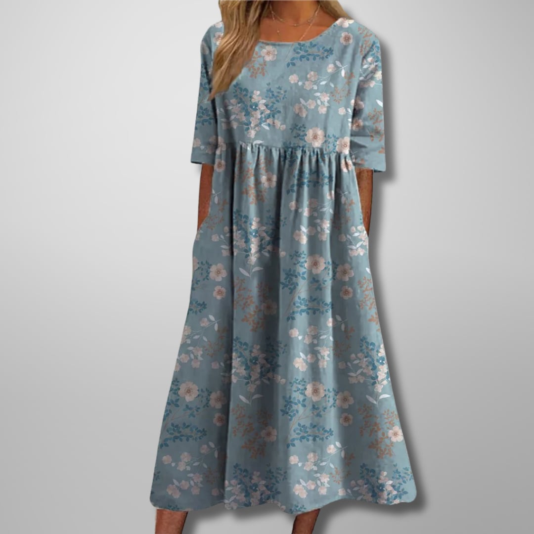 Side view of the floral midi dress showing the flattering relaxed drape and midi length