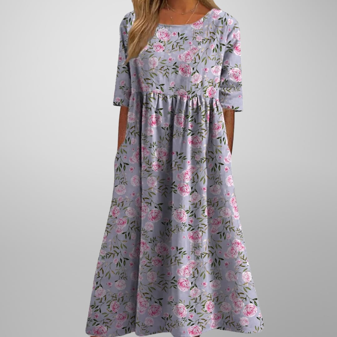 Floral midi dress styled with sandals for a summer brunch or wedding guest look