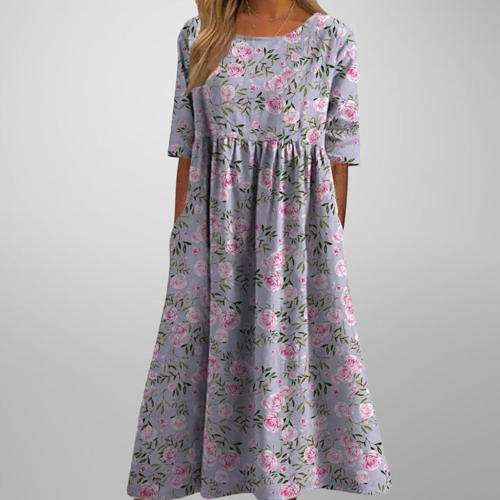 Floral midi dress styled with sandals for a summer brunch or wedding guest look
