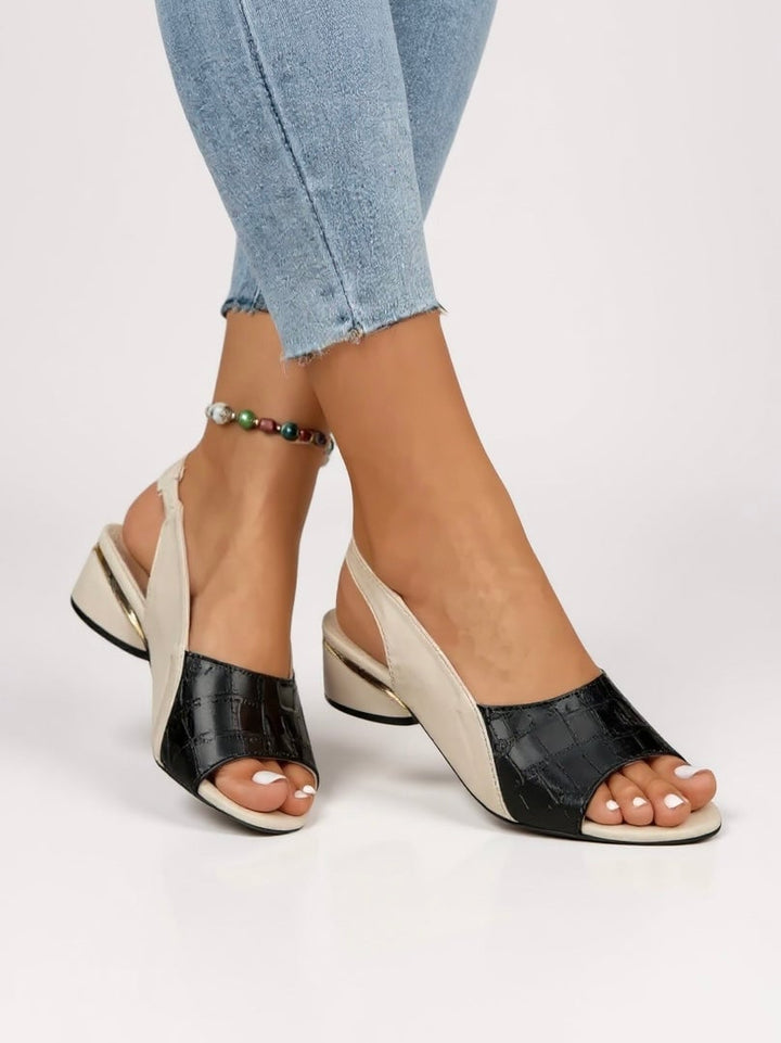 Garnet women's adjustable slingback sandals in black with cushioned insole and lightweight sole