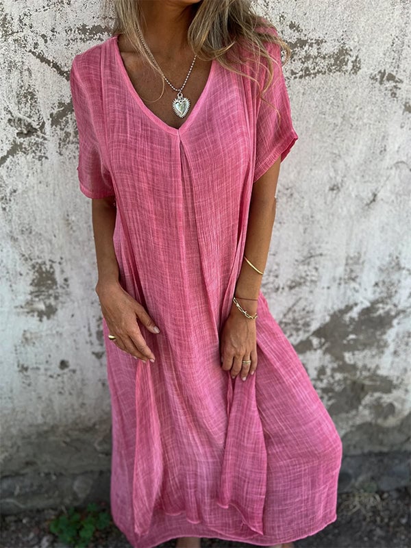 Model in apricot maxi dress showing flattering fit across multiple body types