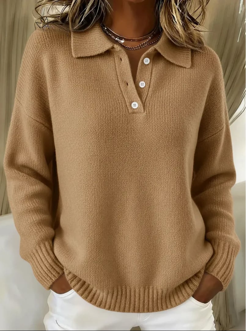 Flat lay of the Genesis polo sweater in red displaying the button placket and ribbed collar detail