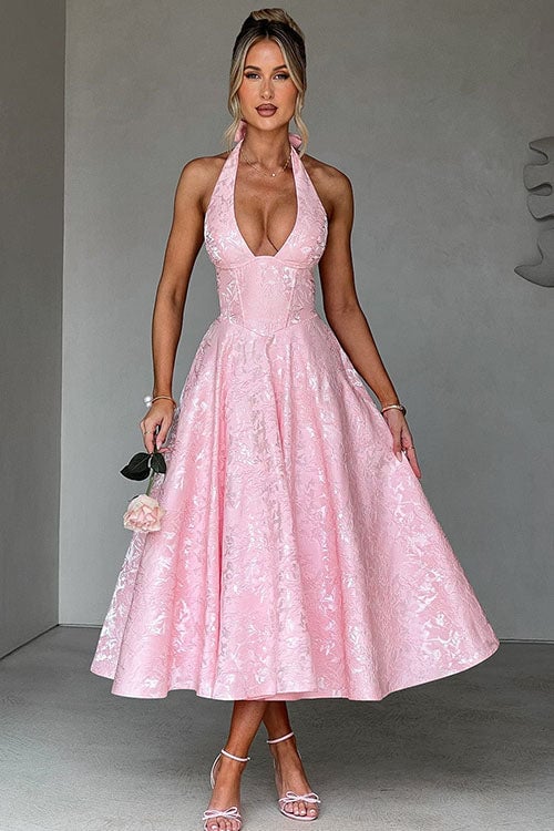 Black V-neck halterneck sleeveless jacquard maxi dress on a model showing the silhouette and fit
