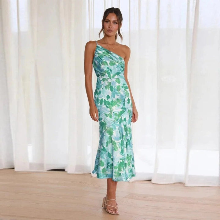 Front view of the Genevieve floral midi dress showing the asymmetric hemline detail