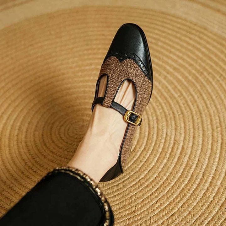Side view of Cosima two-tone Mary Janes showing textured fabric panels and leather-look trim