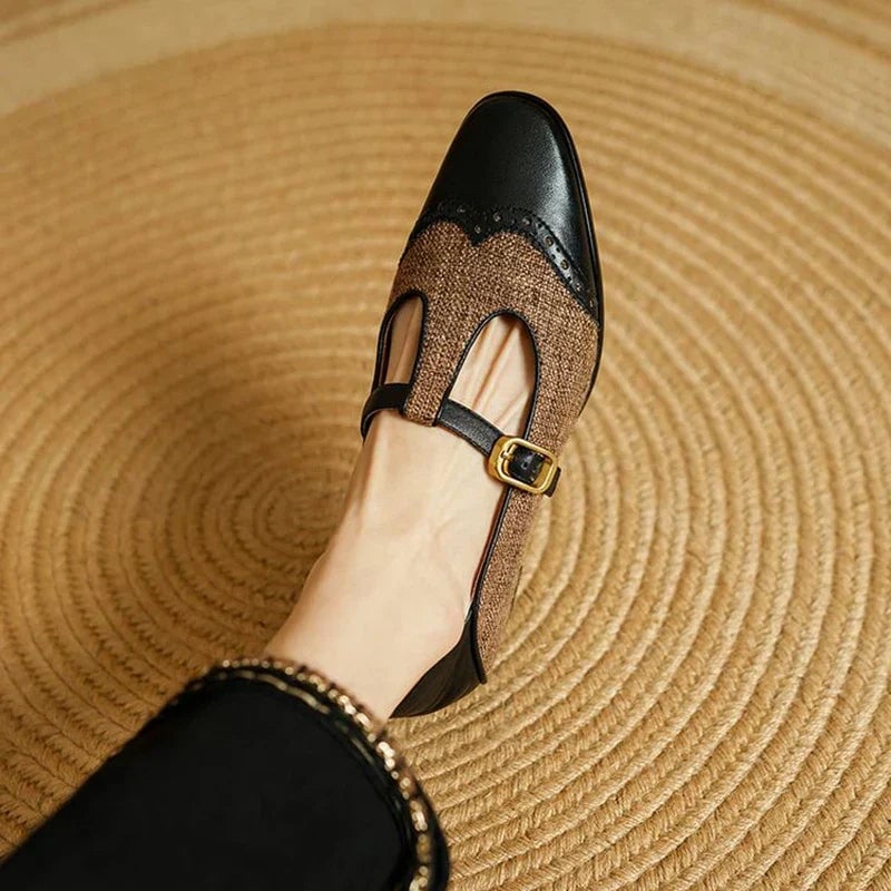 Side view of Cosima two-tone Mary Janes showing textured fabric panels and leather-look trim