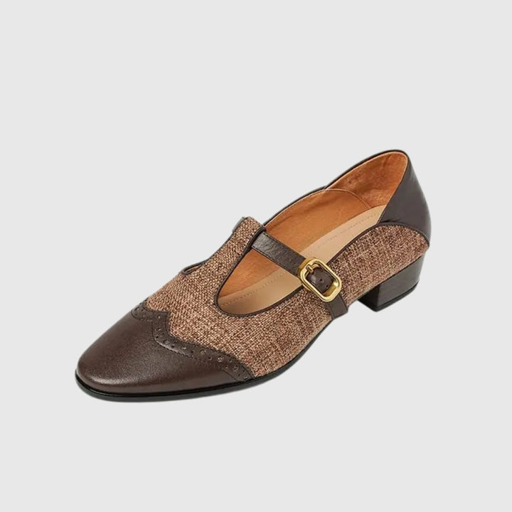 Cosima Mary Jane shoes in brown colorway with T-strap buckle, angled view