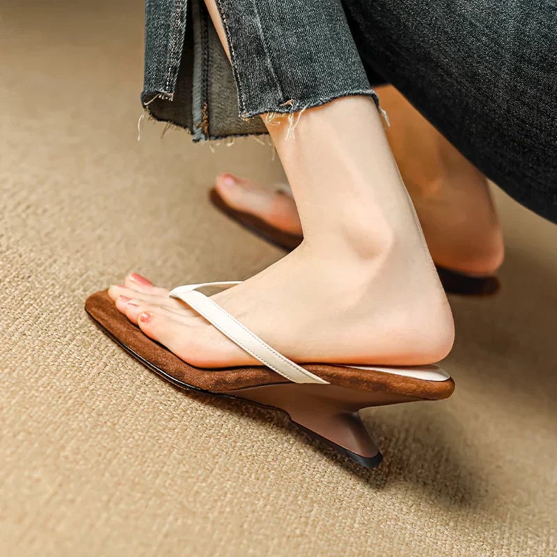 Close-up of the Georgette wedge sandal strap detailing in beige