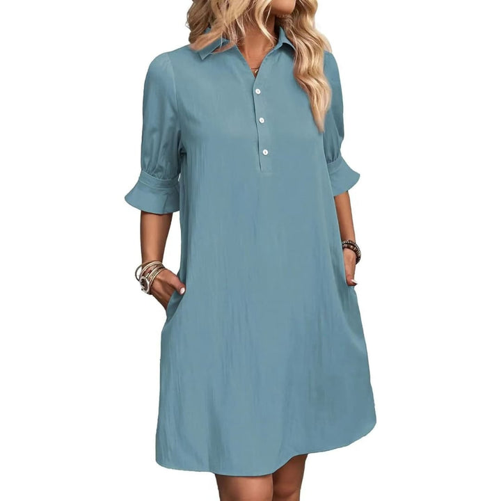 Georgia shirt dress styled in pink with a relaxed, elegant fit on a female model