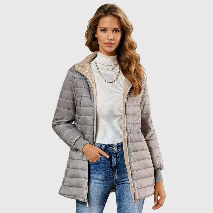 Woman wearing the Geraldine sherpa-lined winter coat in gray, shown from the front against a neutral background