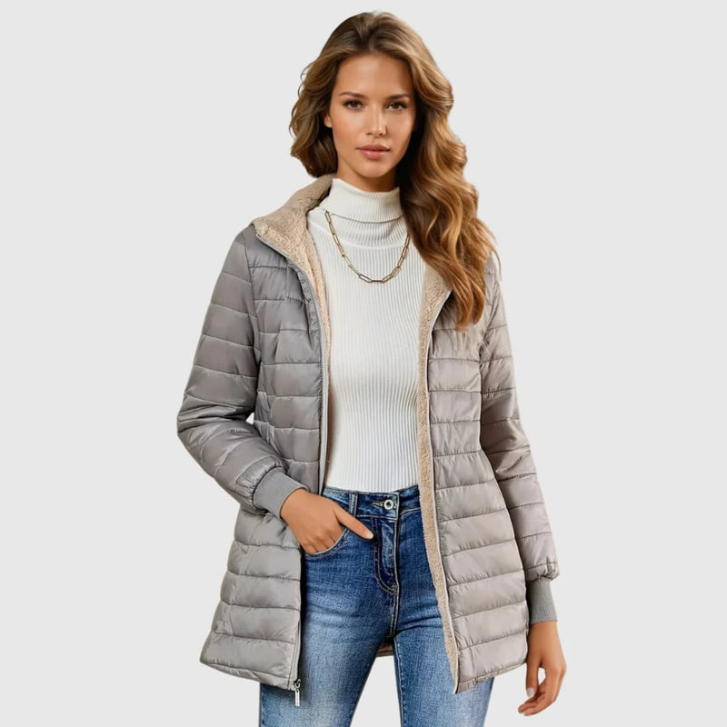 Woman wearing the Geraldine sherpa-lined winter coat in gray, shown from the front against a neutral background