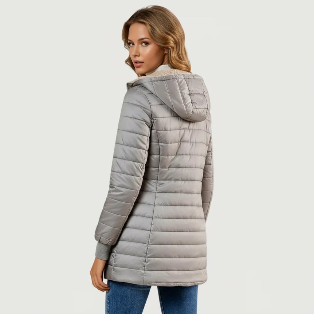 Full-length back view of the Geraldine sherpa-lined winter coat in blue
