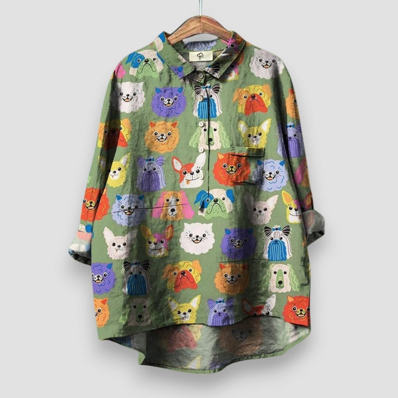 Women's dog print shirt styled with jeans, shown in a lifestyle setting