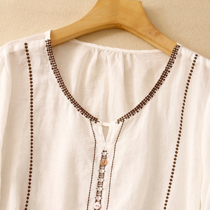 Side view of the pattern ruffle sleeve blouse showing relaxed airy fit and flowing silhouette