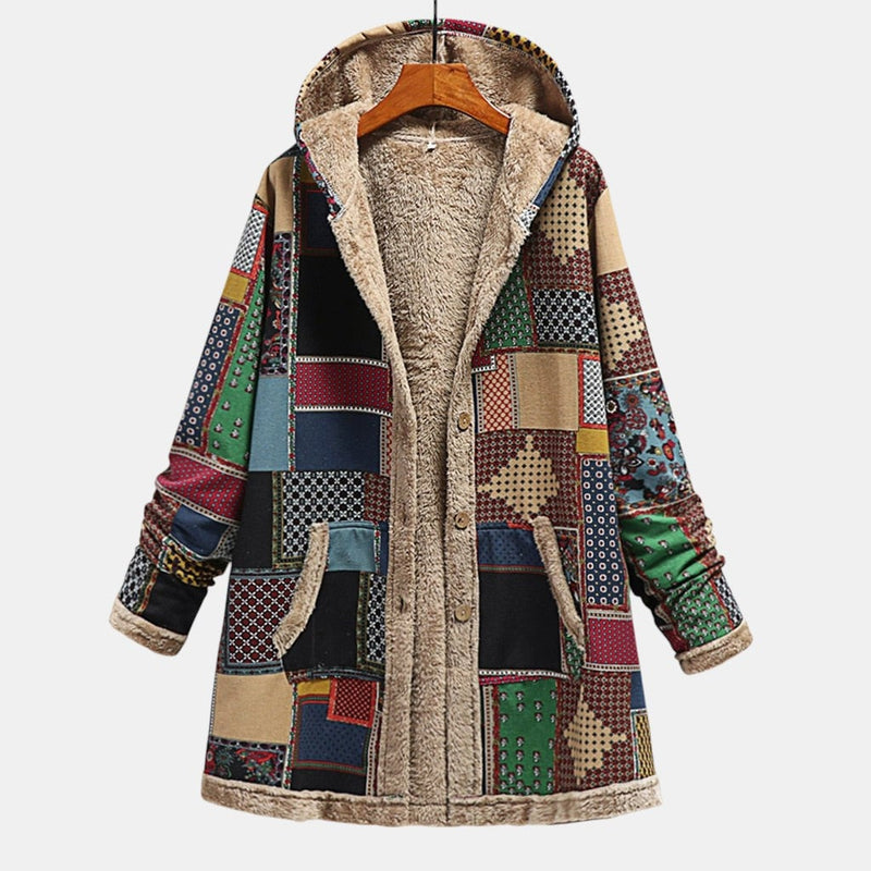 Woman wearing a cozy multicolor hooded jacket with a relaxed fit, ideal for casual everyday wear