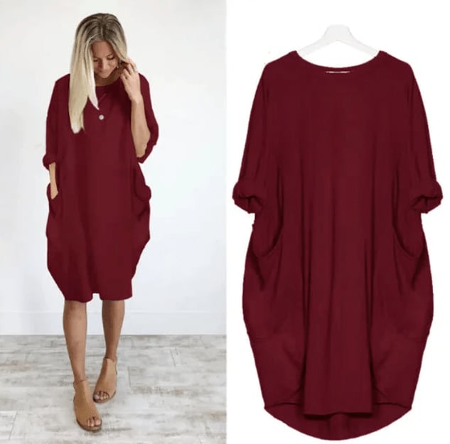 Close-up of the Gina dress showing the hidden side pocket detail and soft fabric drape