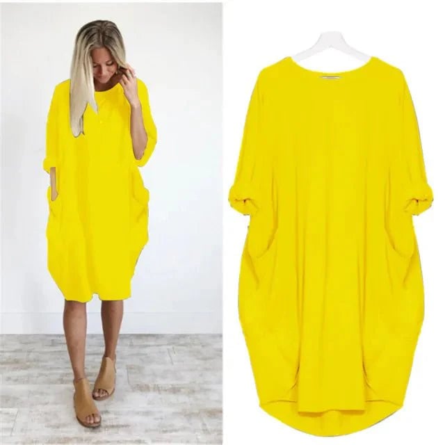 Back view of the Gina dress showing the clean, minimal silhouette