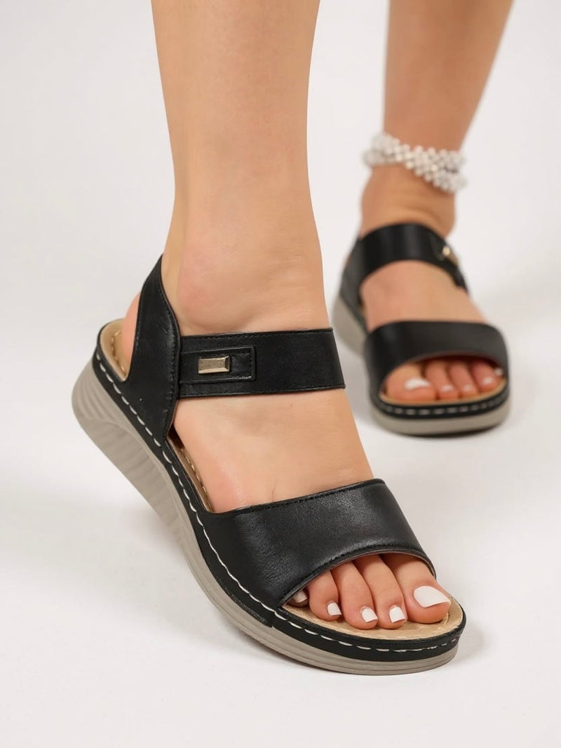 Giselle sandals in beige, angled front view on a clean white background