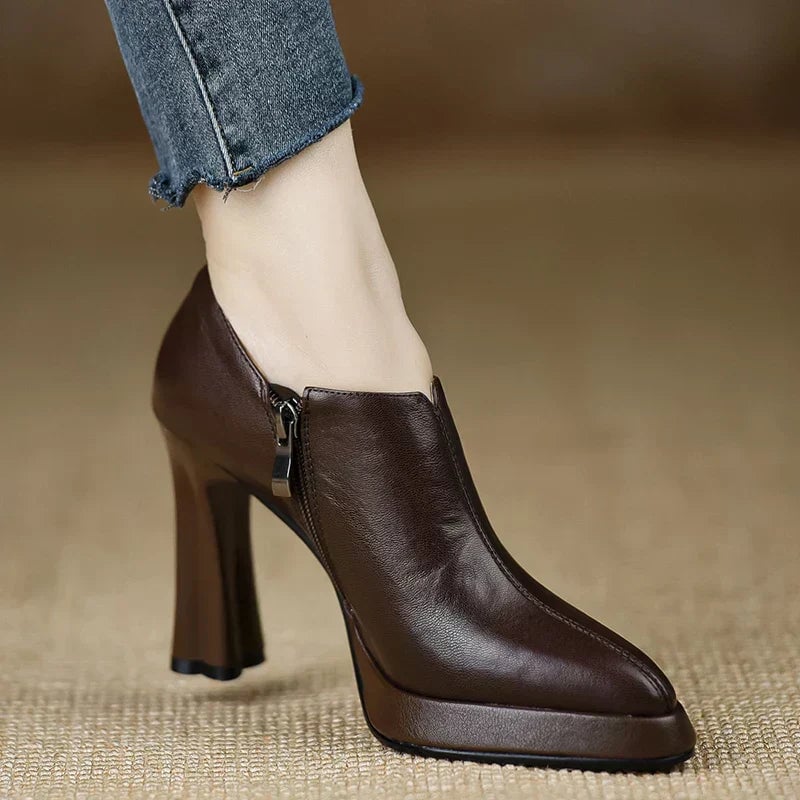 Giselle platform block heel pumps in black with side zipper detail, front view