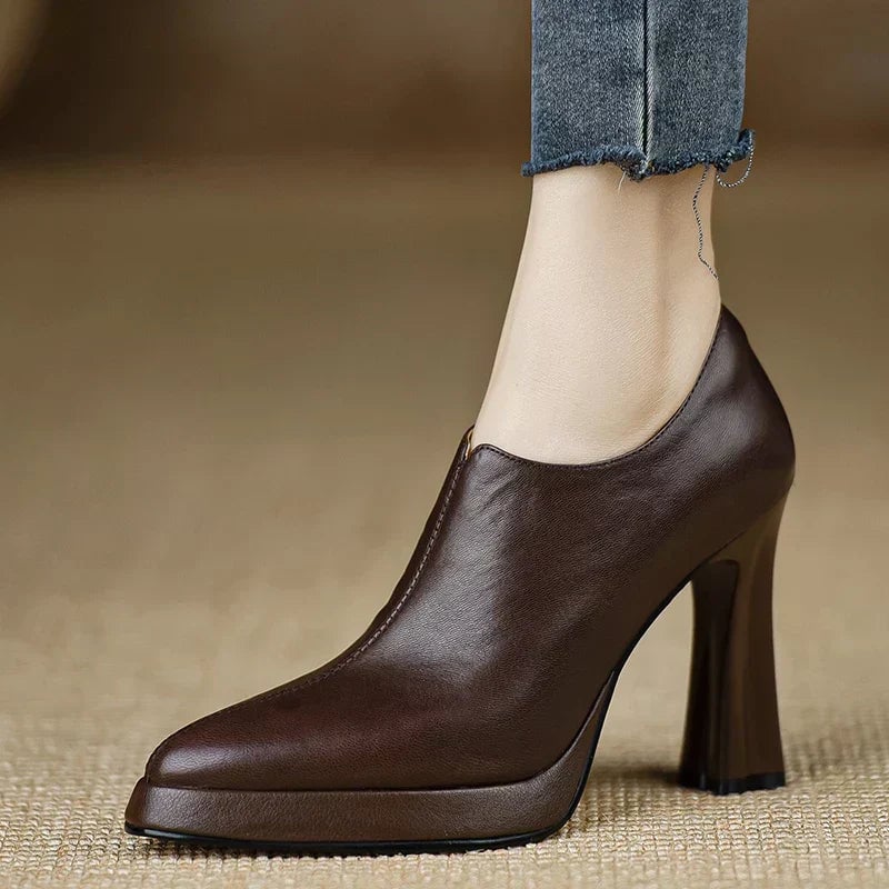 Giselle platform pumps in brown, front three-quarter view on neutral background