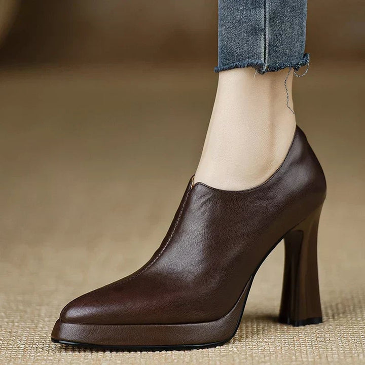 Giselle platform pumps in brown, front three-quarter view on neutral background