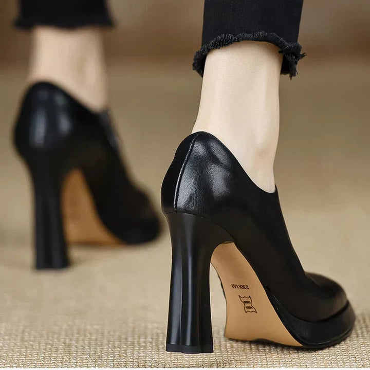 Heel and sole detail of the Giselle platform pump showing structured block heel